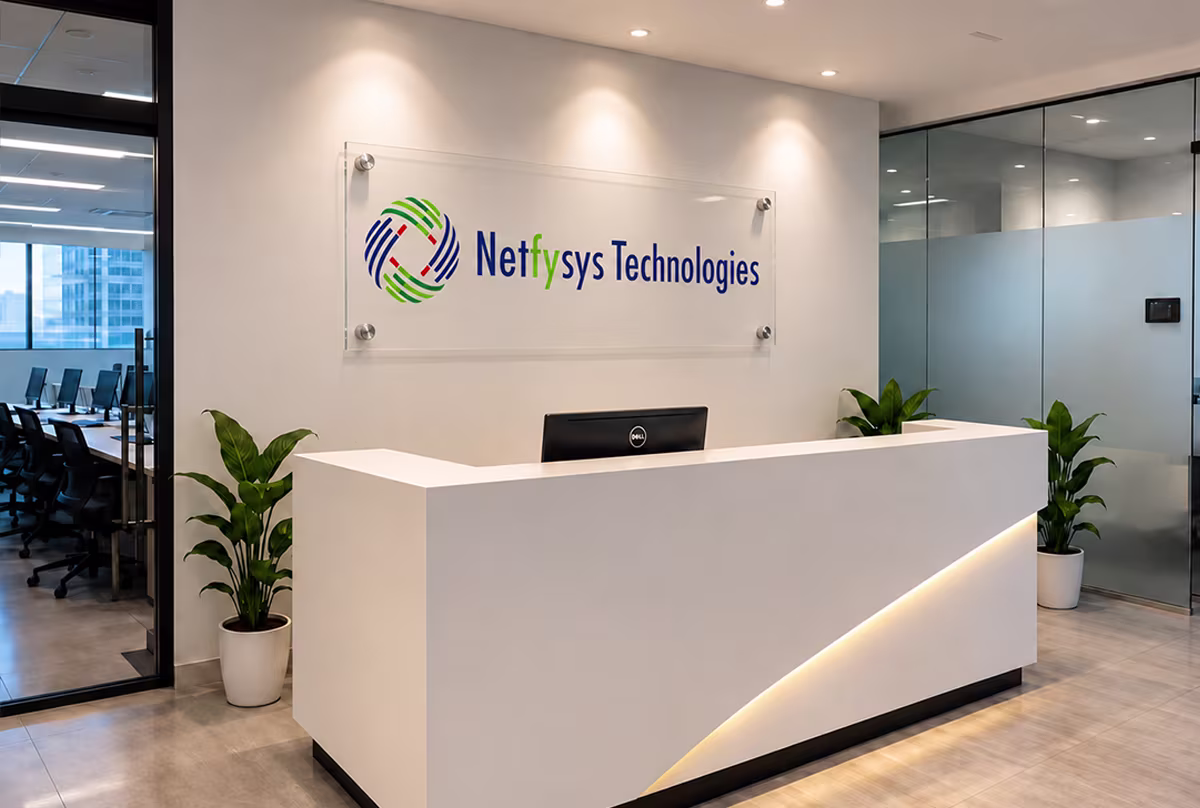 The Netfysys Technologies reception, with the company logo mounted on the wall behind the front desk